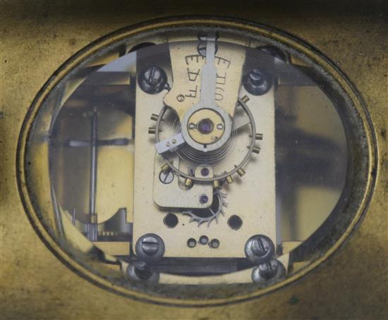 A French brass cased eight day repeating carriage clock, 4.75in ex. handle.